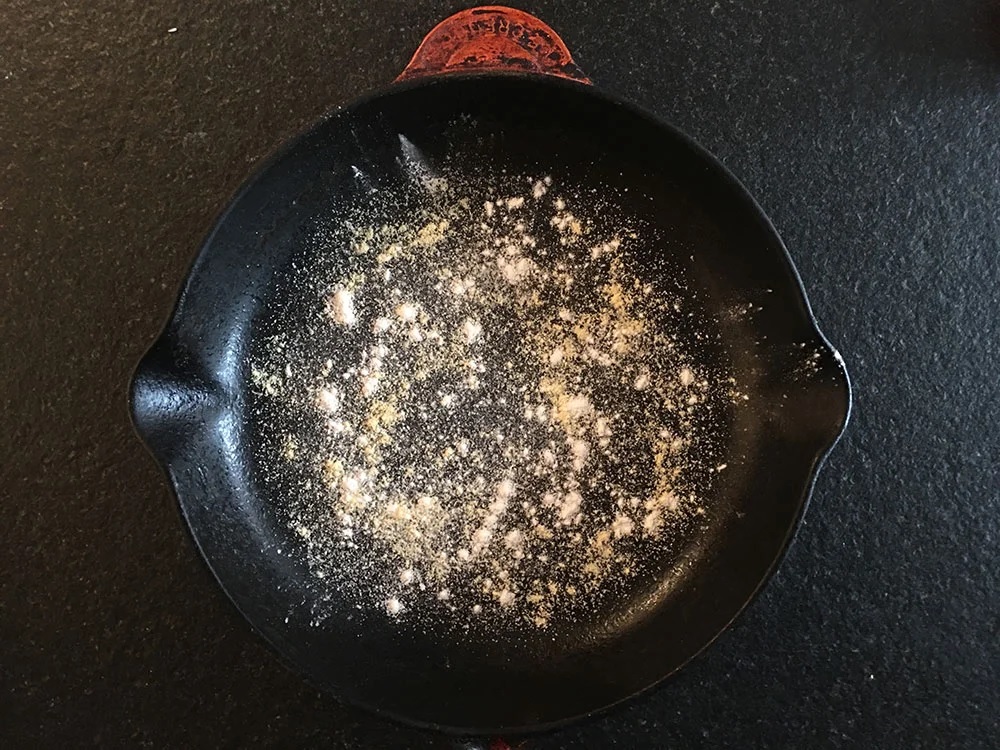 Prep the skillet with flour and cornmeal