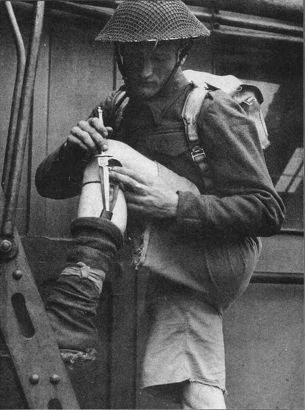 A commando conceals his F-S knife in a sheath on his calf.